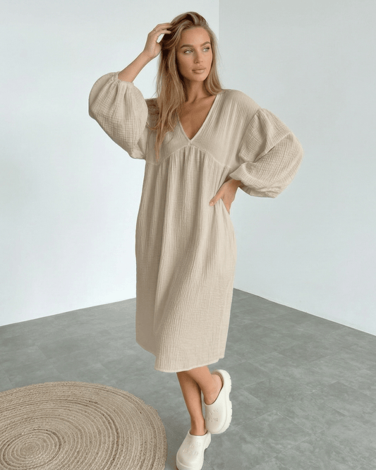 Calista Midi Dress - Beige cotton dress with puff sleeves, modern minimalism, by Lauven, for everyday elegance.