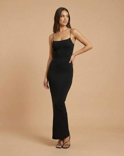 Calypso Maxi Dress by Lauven - Minimal black backless maxi dress with spaghetti straps, elegant and sleek design.
