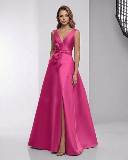 Calyptra Maxi Dress in fuchsia satin, A-line V-neck, elegant evening gown by Lauven, bold and refined design.