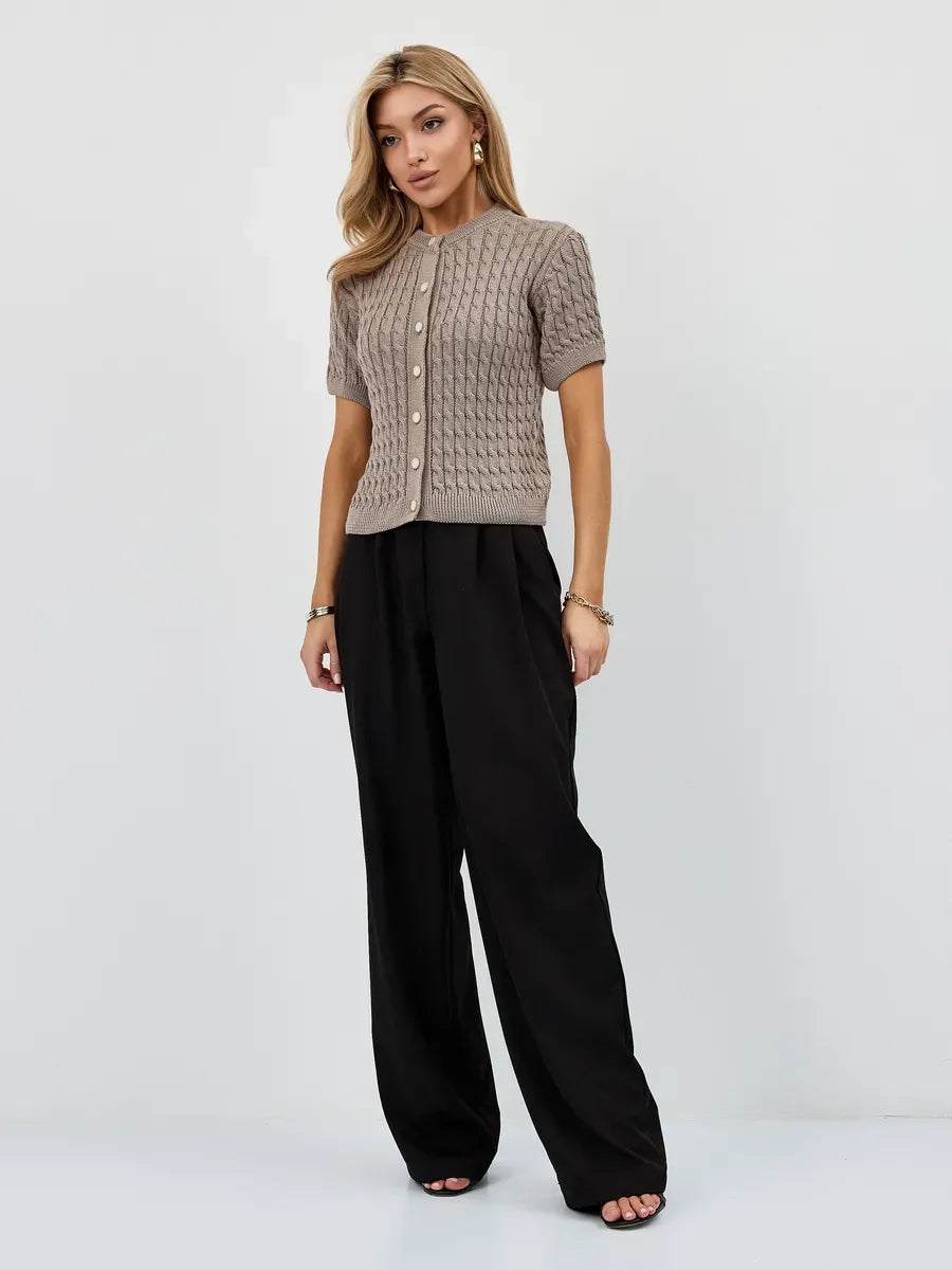 Capri Cardigan by Lauven, lightweight cotton-acrylic knitwear in cappuccino styled with black trousers.