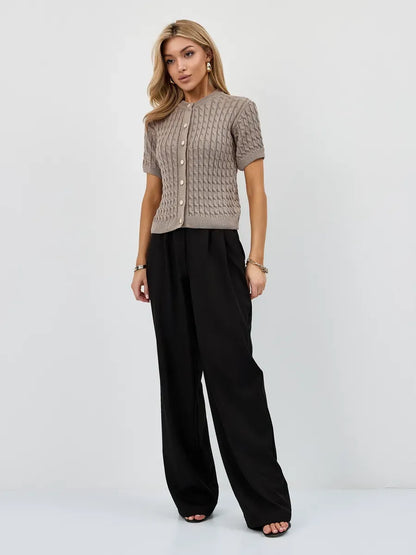 Capri Cardigan by Lauven, lightweight cotton-acrylic knitwear in cappuccino styled with black trousers.