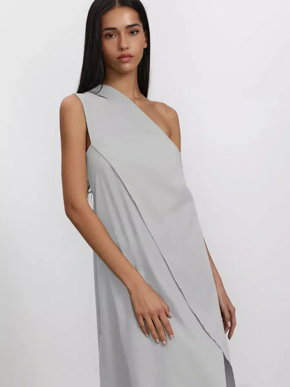 Cascade Maxi Dress featuring a one-shoulder design in soft grey, crafted from breathable cotton for elegance and comfort.