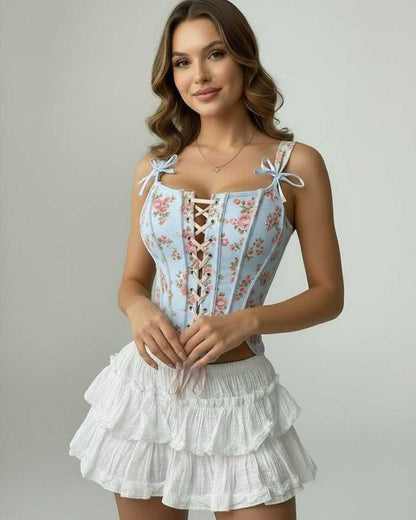 Celeste Corset Top by Lauven featuring a blue floral lace-up design and structured silhouette.