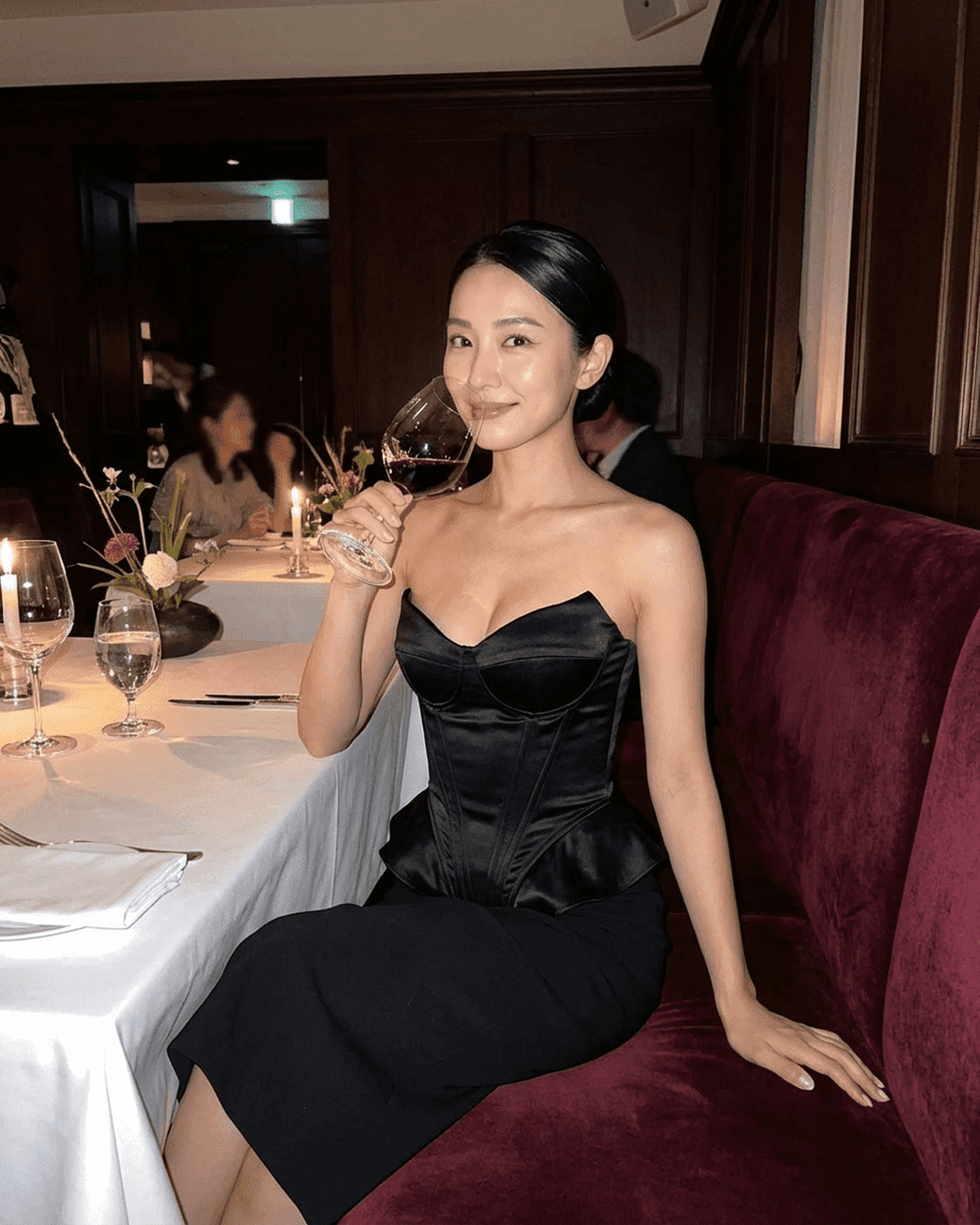 Celeste Corset Top by Lauven, strapless satin corset showcased elegantly in a fine dining setting.