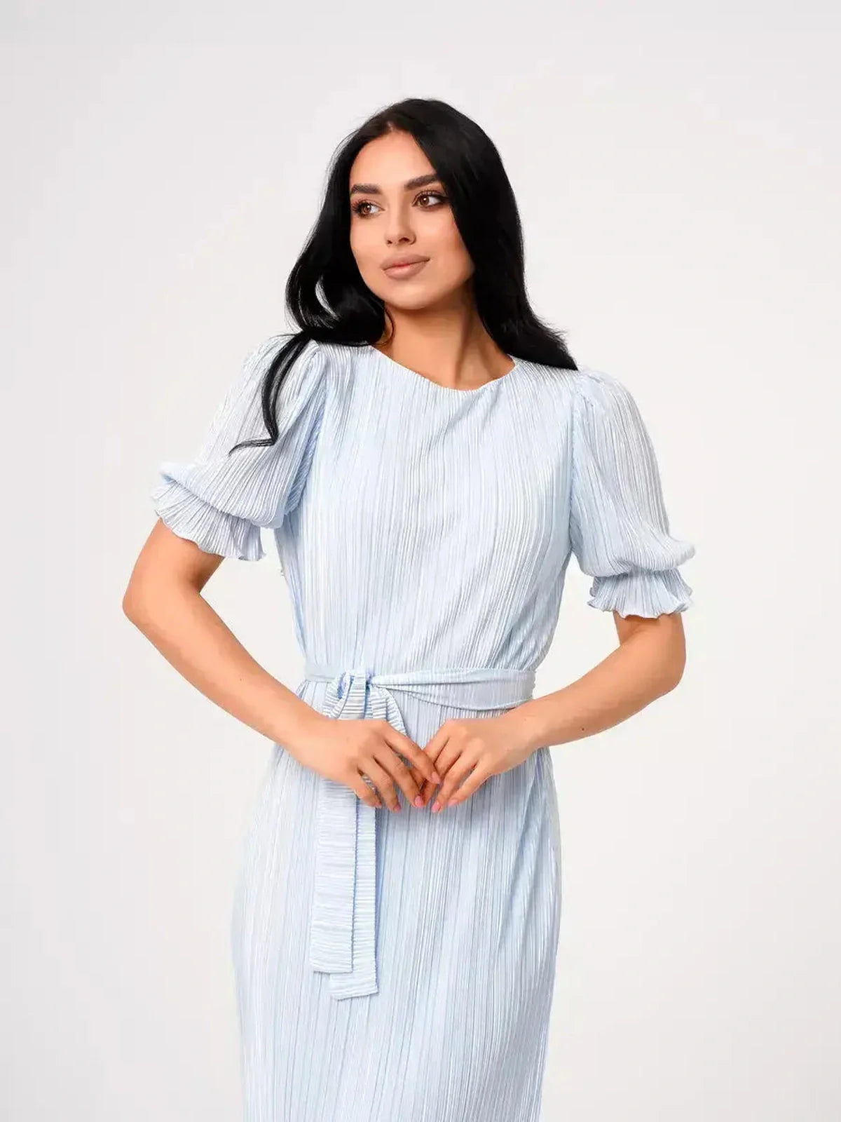 Celeste Flow Maxi Dress in light blue, featuring pleated fabric, puff sleeves, and a self-tie waist, ideal for summer events.