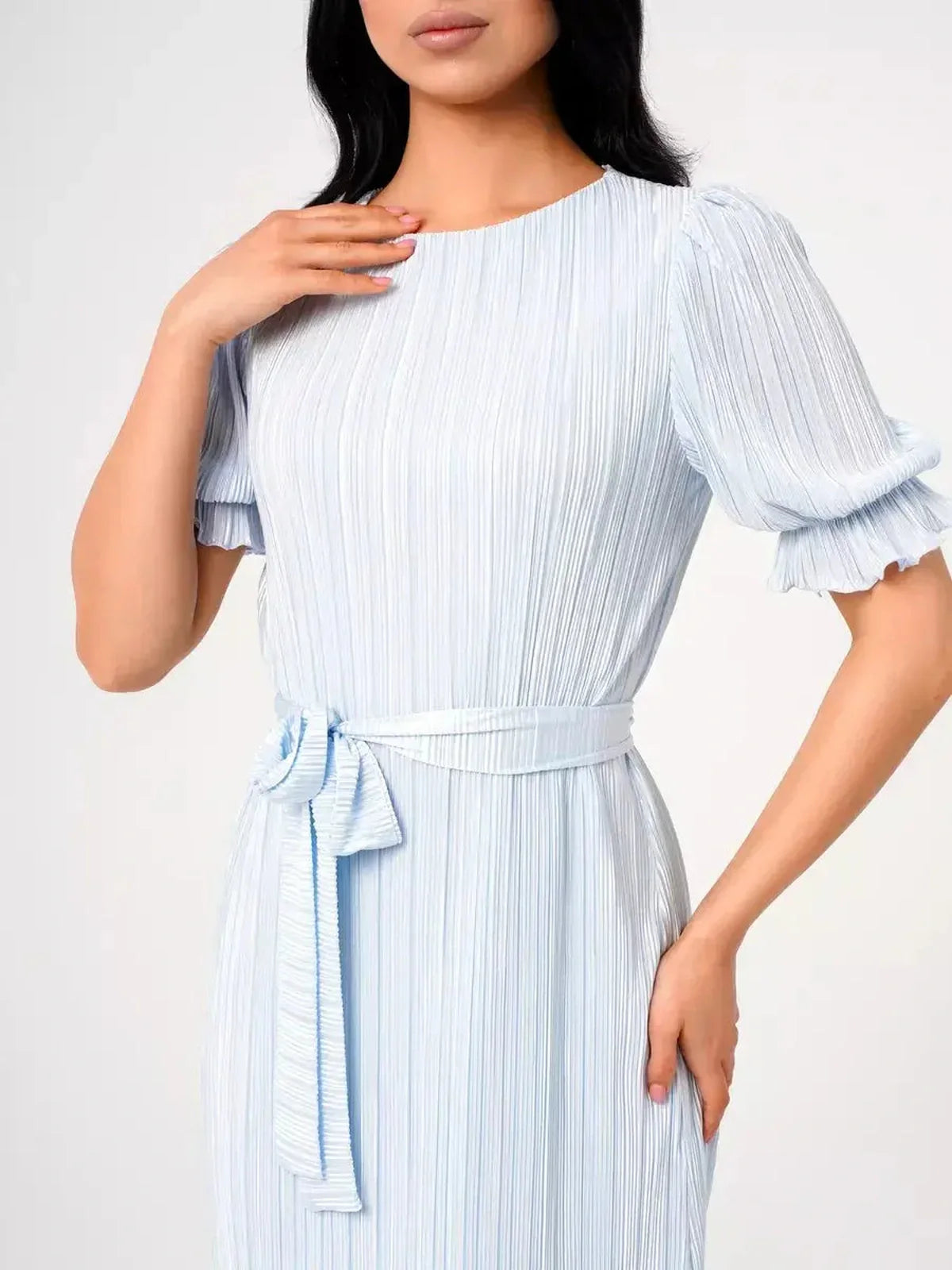 Light blue pleated maxi dress with puff sleeves and self-tie waist, perfect for summer and formal occasions.