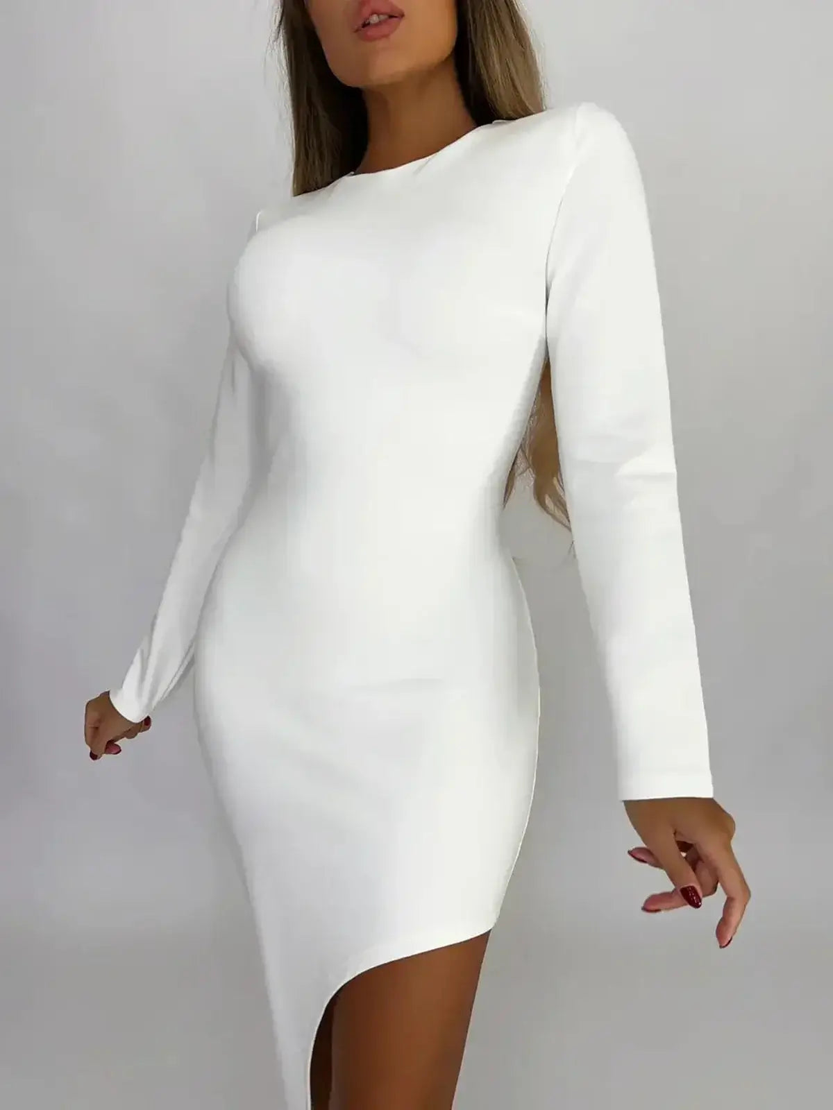 Celeste Maxi Dress in creamy-white fabric featuring a sophisticated silhouette and asymmetric hemline, ideal for elegant evenings.