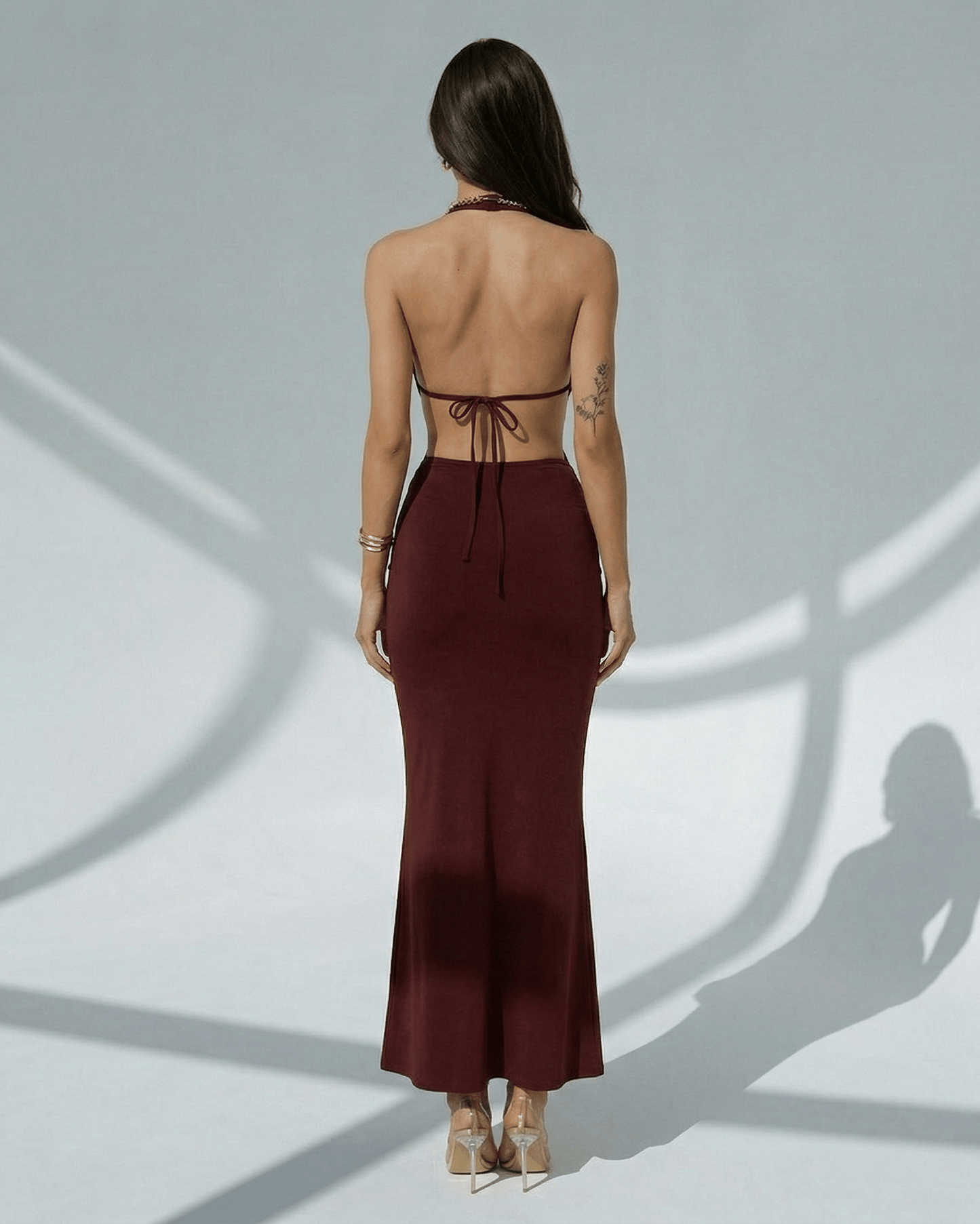 Celeste Maxi Dress back view, elegant burgundy bodycon with deep V-neck, adjustable waist by Lauven.