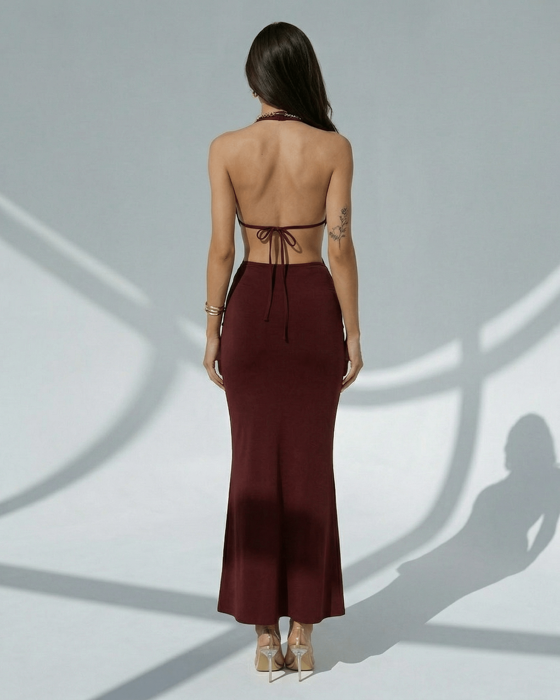 Celeste Maxi Dress back view, elegant burgundy bodycon with deep V-neck, adjustable waist by Lauven.