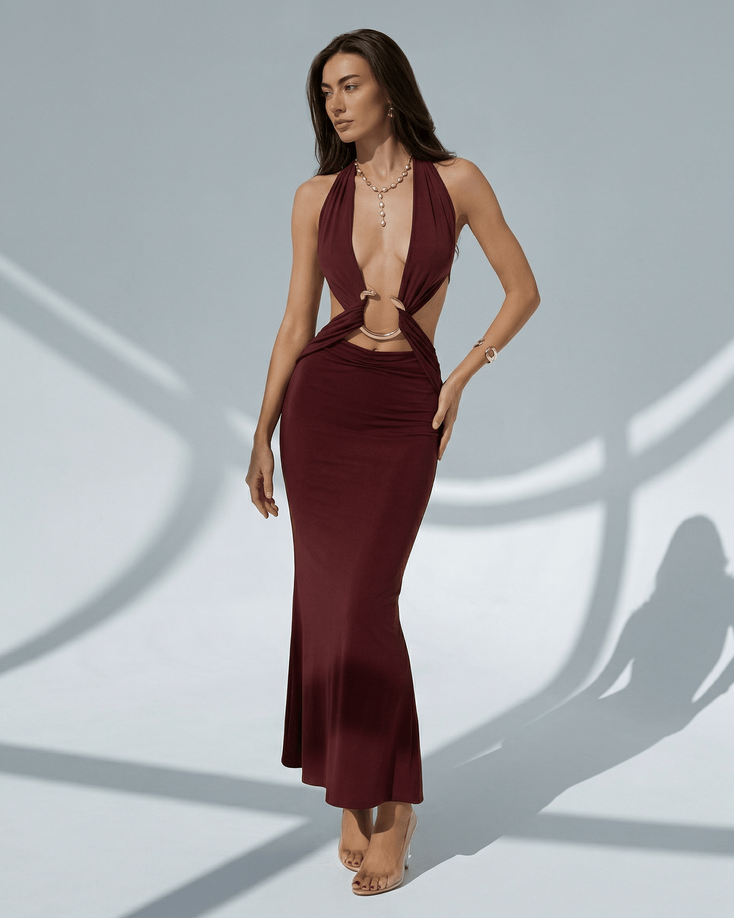 Celeste Maxi Dress in burgundy, elegant bodycon fit with deep V-neck, showcasing adjustable waist and luxe style by Lauven.