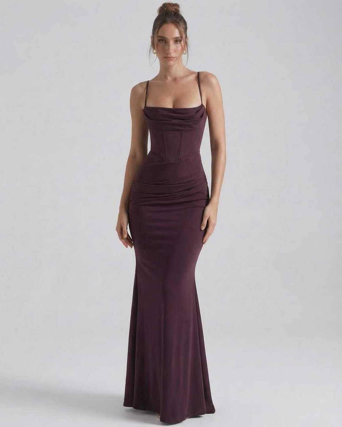 Celeste Maxi Dress featuring a sleek sheath silhouette, spaghetti straps, deep plum color, and made by Lauven.