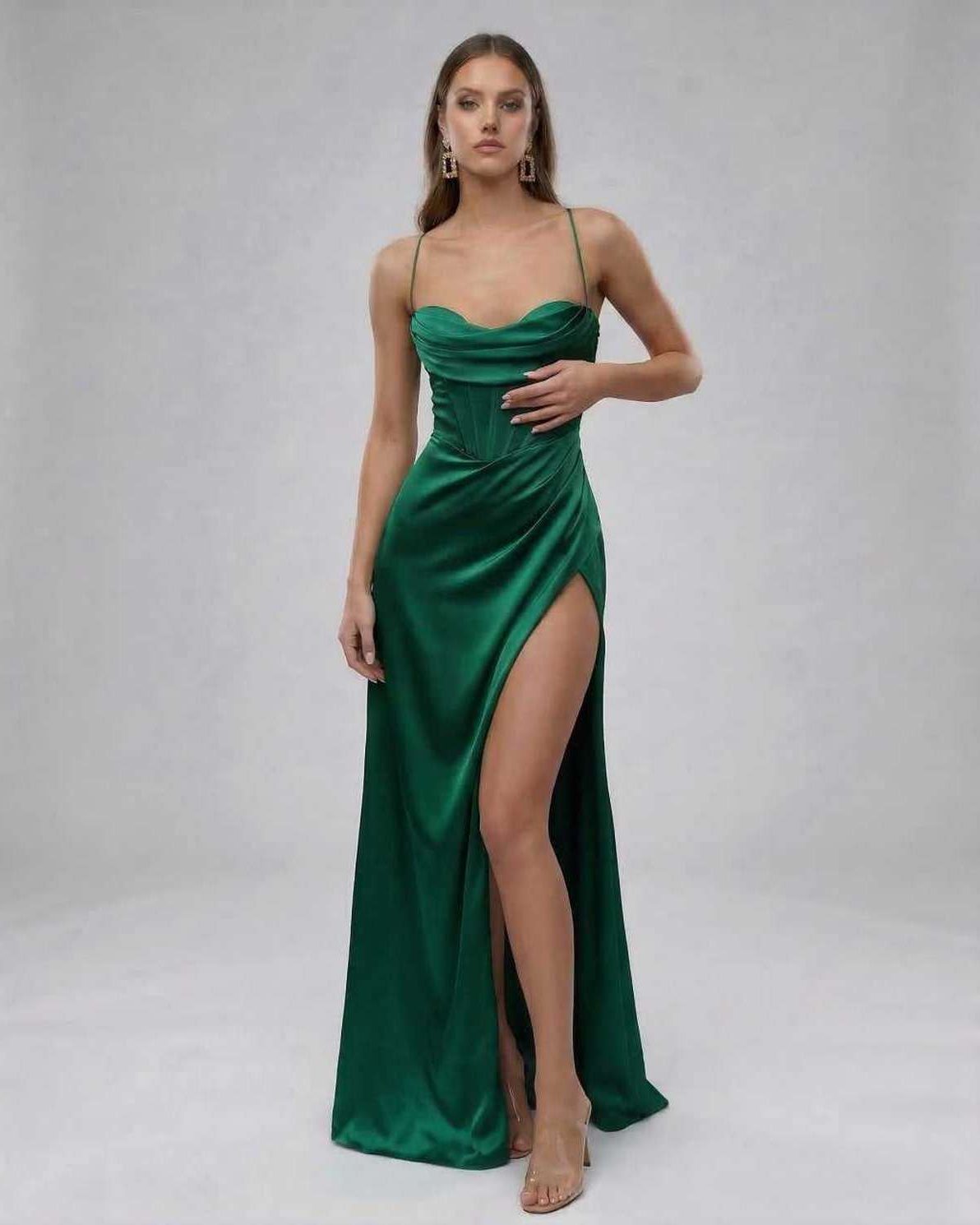 Celeste Maxi Dress by Lauven, elegant emerald satin gown with high slit showcasing sophisticated style.