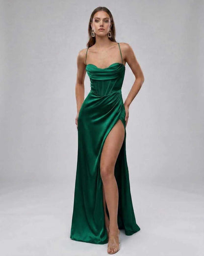 Celeste Maxi Dress by Lauven - Elegant emerald satin gown with high slit, showcasing a modern silhouette.