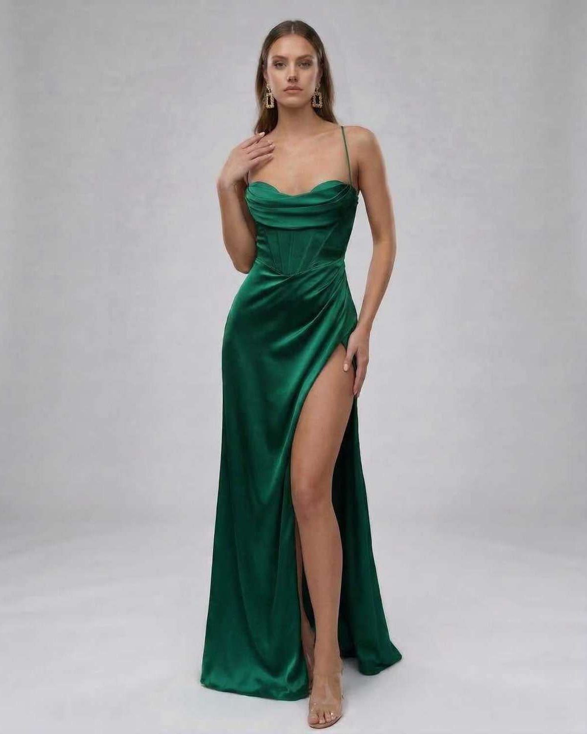 Celeste Maxi Dress by Lauven - Elegant emerald satin gown with high slit, showcasing a modern silhouette and silky finish.