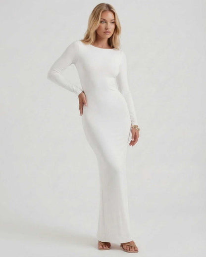 Celeste Maxi Dress by Lauven - Elegant white long sleeve dress with open back and a flattering silhouette.