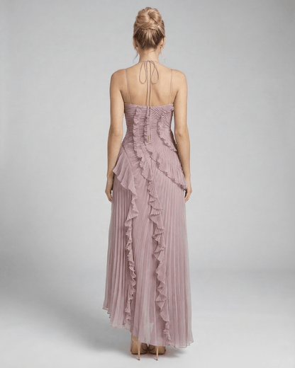 Celeste Maxi Dress by Lauven, elegant pleated halter neck silhouette in dusty mauve, showcasing back view with ruffle details.