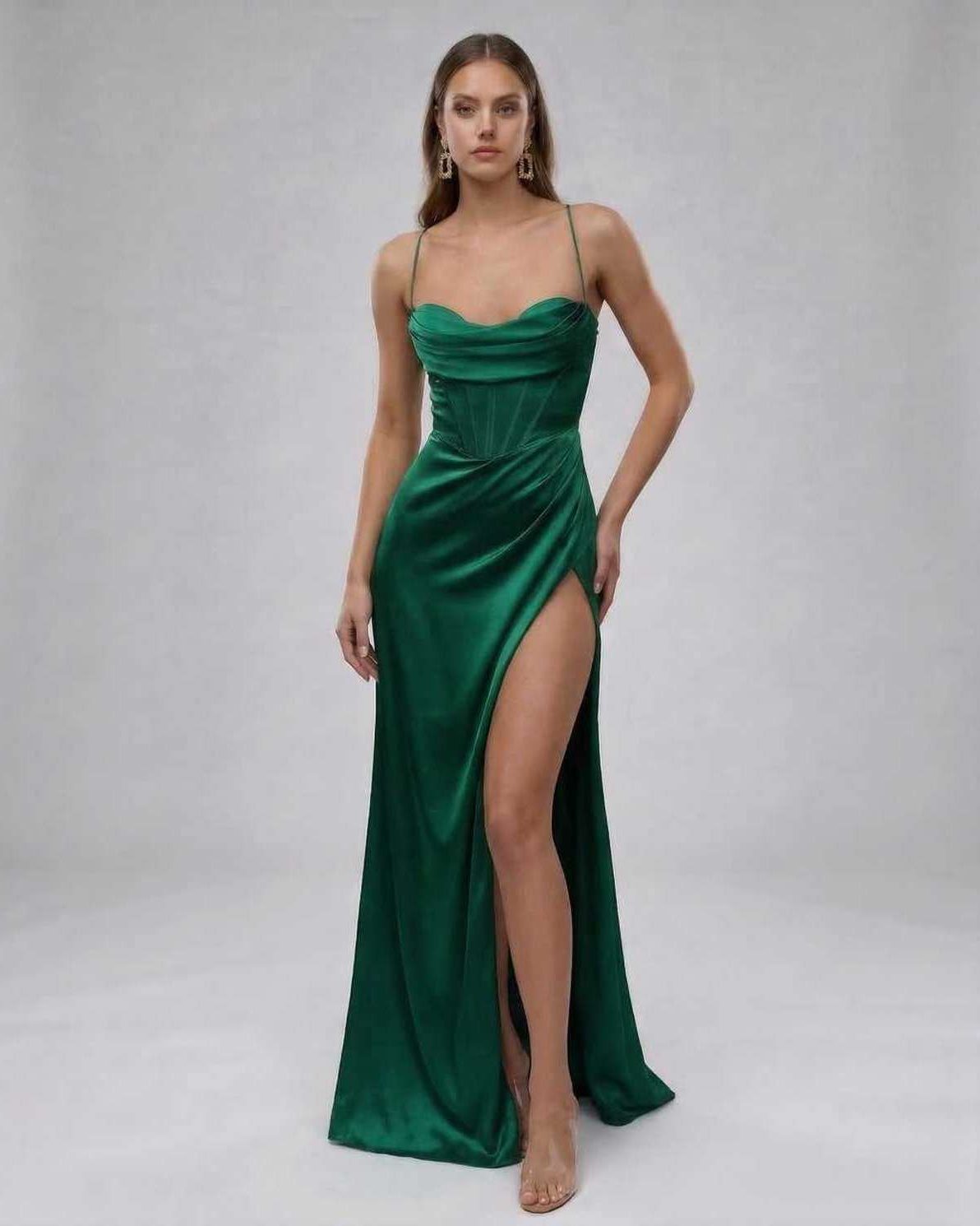Celeste Maxi Dress by Lauven - Elegant emerald satin gown with high slit, showcasing a modern silhouette.
