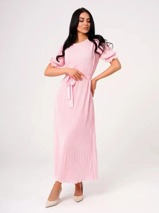 Celeste Maxi Dress in pink with pleated detail, puff sleeves, and tie waist, perfect for weddings and summer events.
