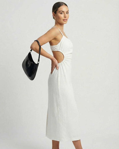 Celeste Midi Dress by Lauven showcasing a ruched sleeveless design and backless strappy detail in white.