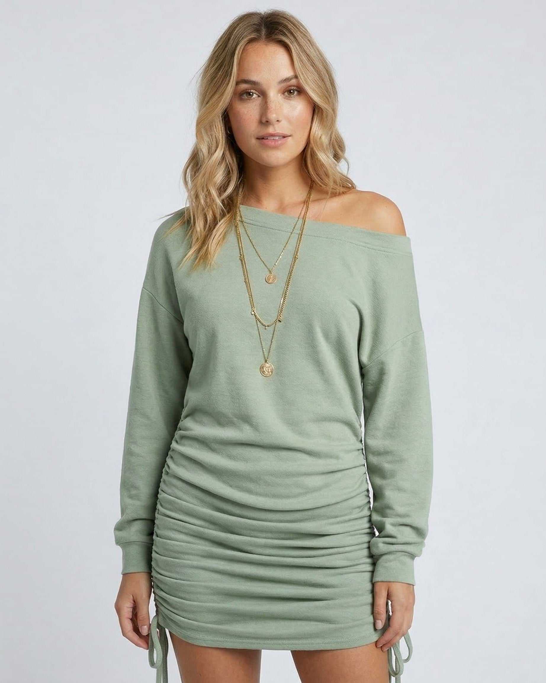 Celeste Mini Dress by Lauven in sage green with gathered drawstring detail, showcasing a modern silhouette.