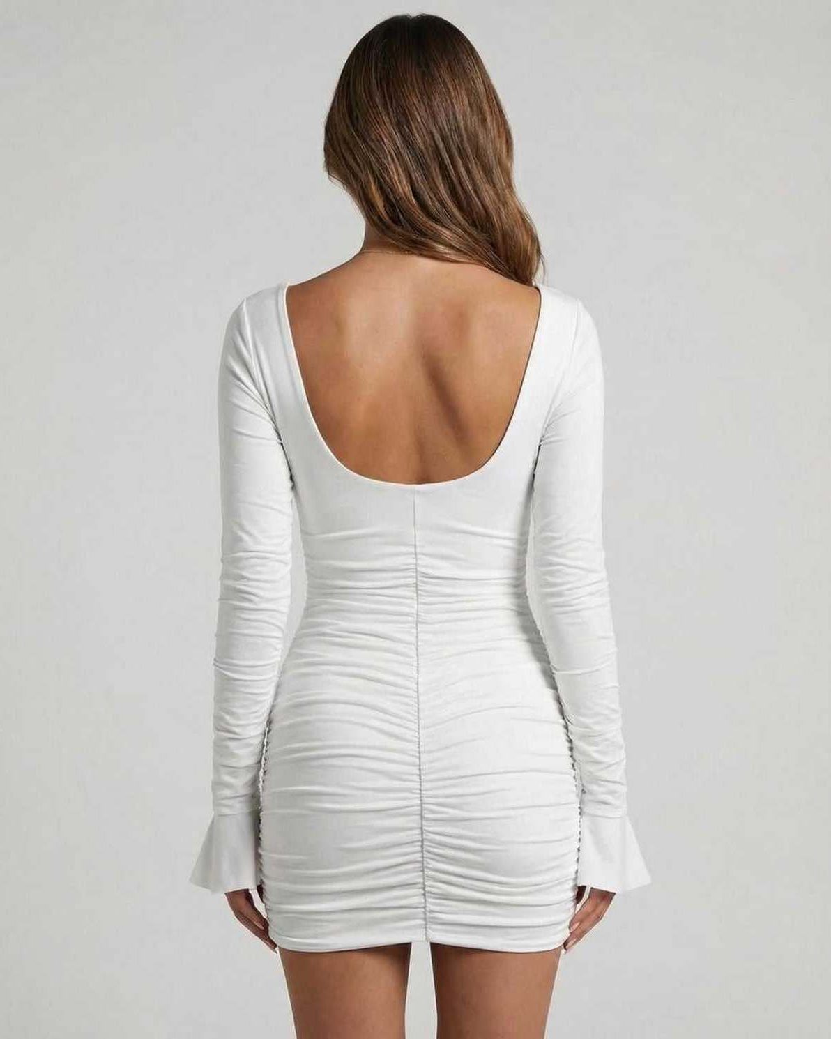 Lauven Celeste Mini Dress back view showcasing long sleeves and cutout design in white