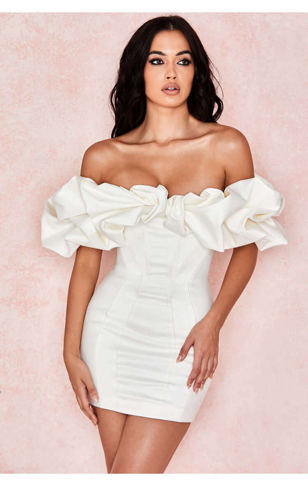 Celeste Mini Dress featuring off-shoulder ruffles, perfect for wedding guests or evening occasions in luxurious satin.