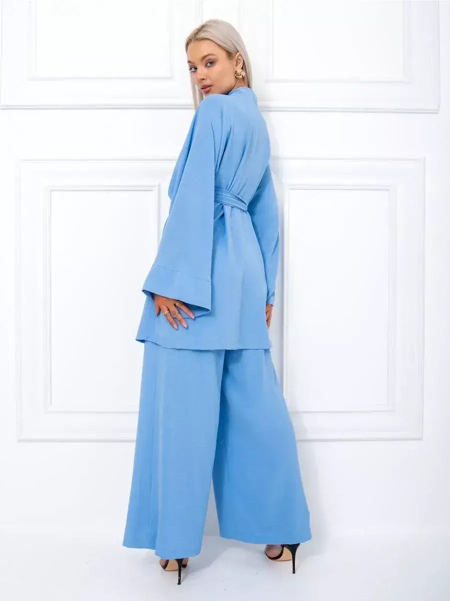 Celeste Suit Set by Lauven, elegant oversize two-piece set in soft blue with kimono-style robe and wide-leg palazzo pants.