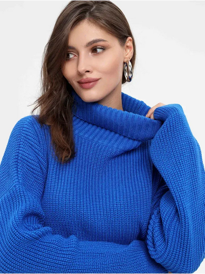 Celeste Sweater by Lauven, oversized blue knit with a turtleneck, perfect for modern fall and winter fashion.