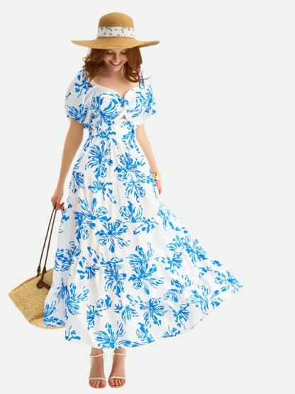 Celestial Petals Maxi Dress featuring cornflower blue floral print, sweetheart neckline, and puff sleeves, perfect for summer.