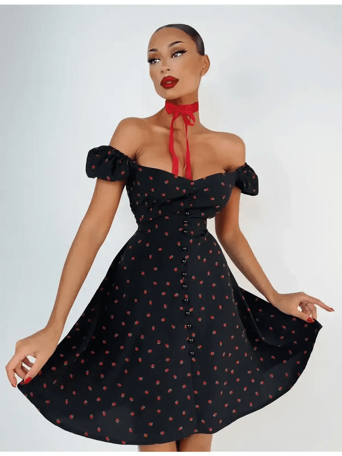 Cherry Kiss Mini Dress featuring cherry print, sweetheart neckline, and puff sleeves, perfect for summer occasions.