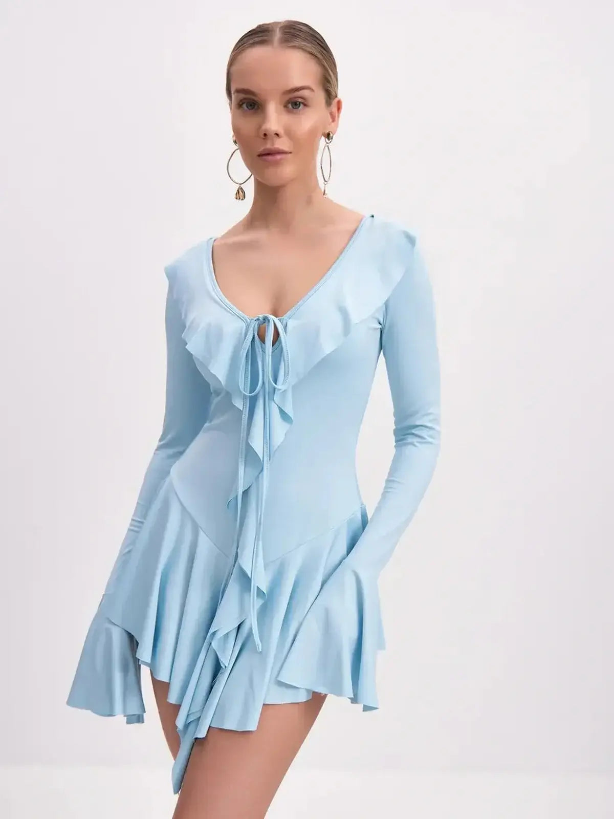 Sky-blue long sleeve Cloud Ruffle mini dress with V-neckline, ruffle trim, and flared skirt for women.