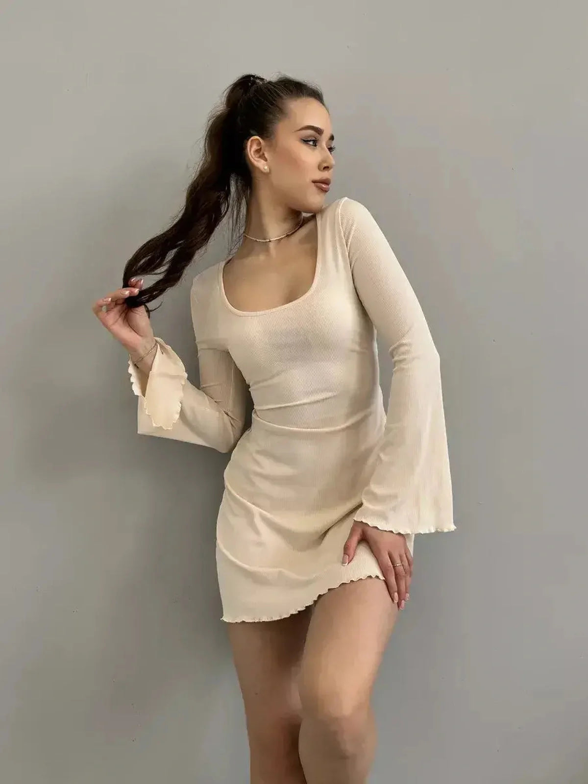 Chic Cream Belle mini dress with long sleeves and square neckline, perfect for summer, cocktail events, and more.
