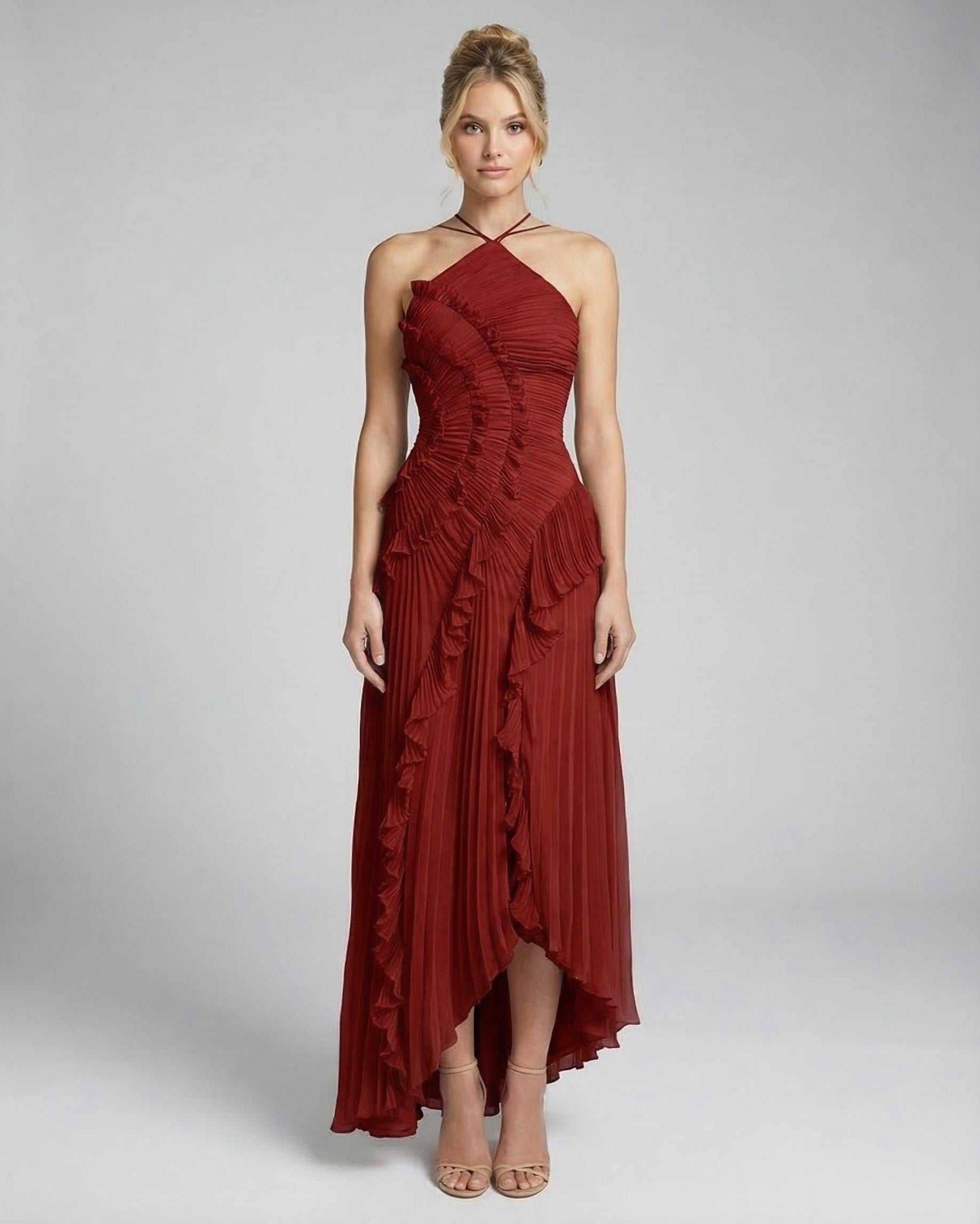 Lauven Crimson Maxi Dress - Elegant pleated halter gown in vibrant red with ruffle details and flattering fit.