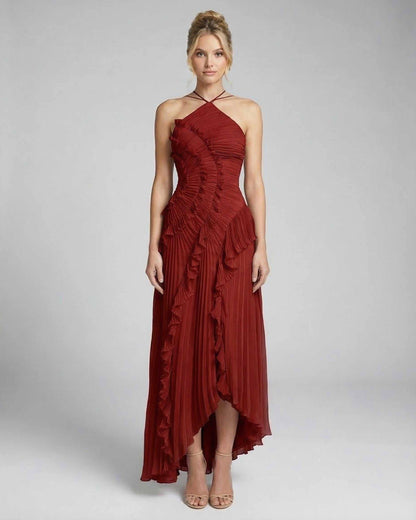 Lauven Crimson Maxi Dress - Elegant pleated halter gown in vibrant red with ruffle details and flattering fit.