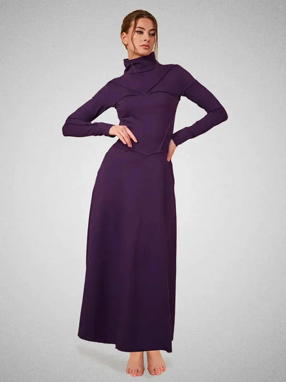 Eclipse Maxi Dress in dark violet, featuring a sculpted silhouette and elegant seam detailing for formal occasions.