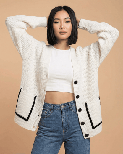 Elara Cardigan by Lauven showcases a loose fit V-neck style with a classic button-front design.