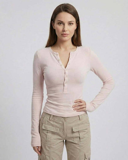 Elara Long Sleeve – Women’s pink slim fit long sleeve top by Lauven with a half-open neckline and button placket.