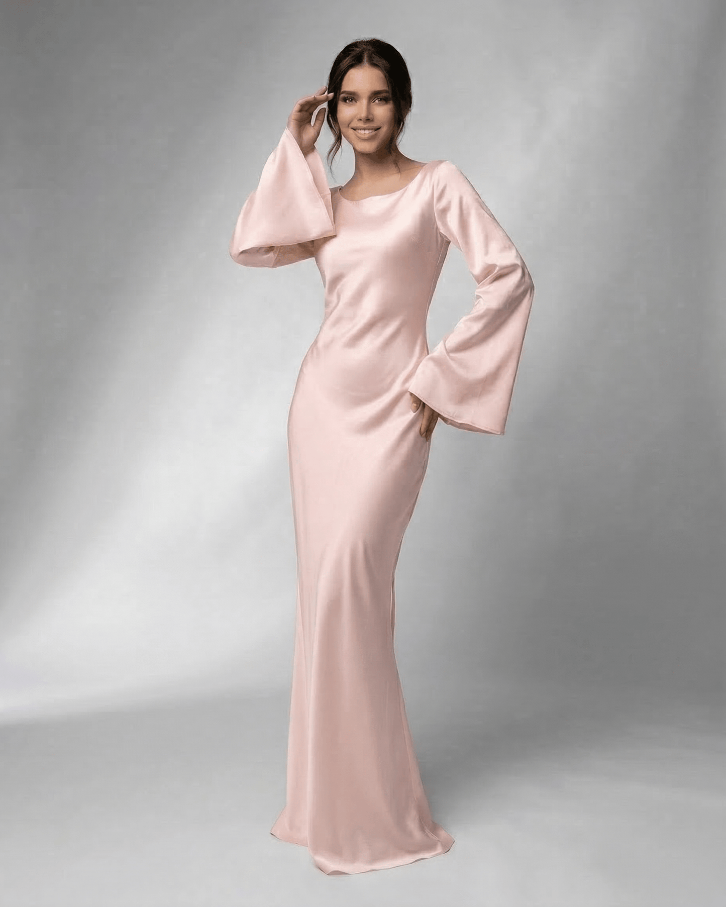 Elara Maxi Dress by Lauven, featuring a flowing silhouette and elegant bell sleeves in blush pink.