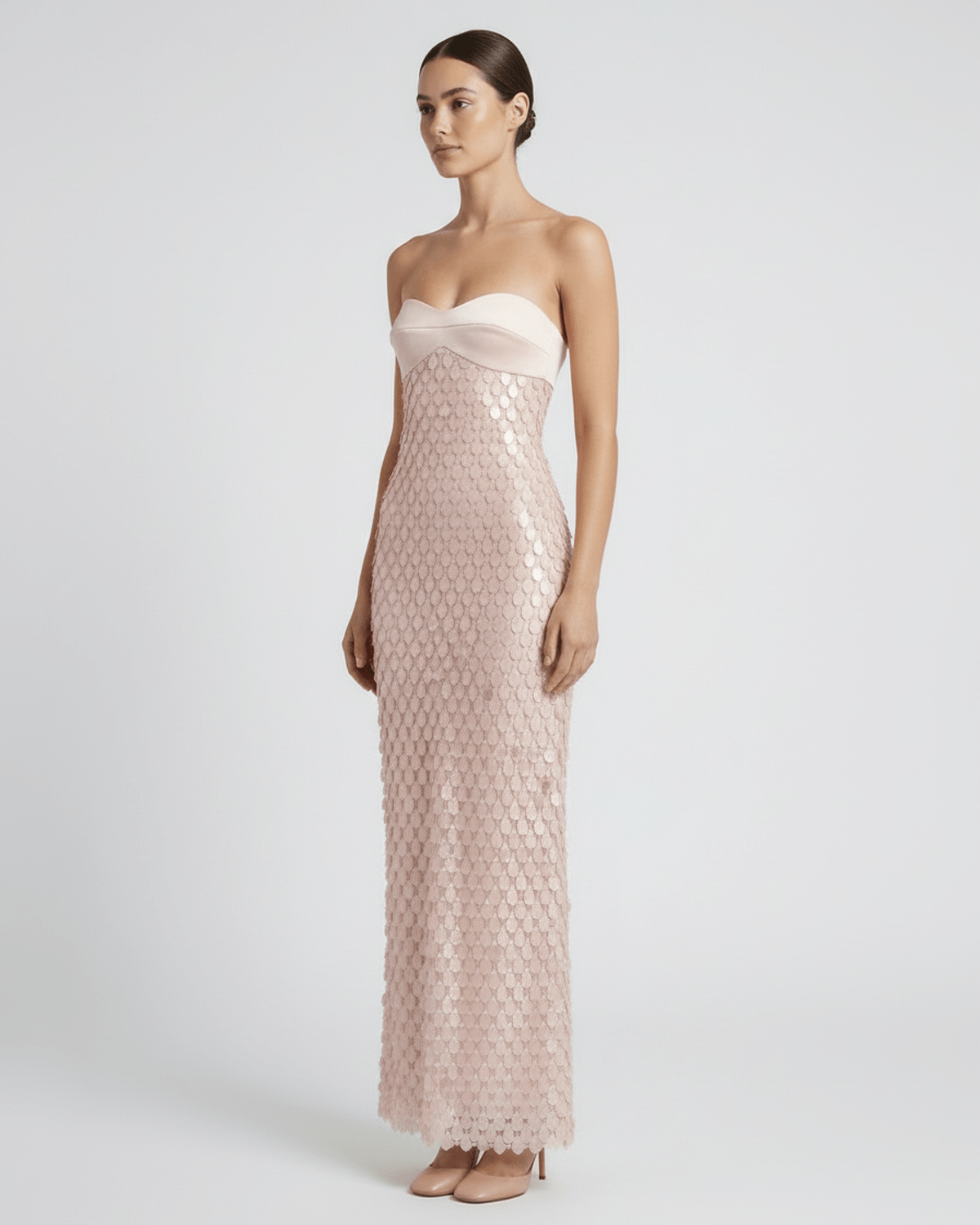 Elara Maxi Dress - Blush pink sequin maxi dress with strapless satin bodice by Lauven, delivering a modern, luminous look.