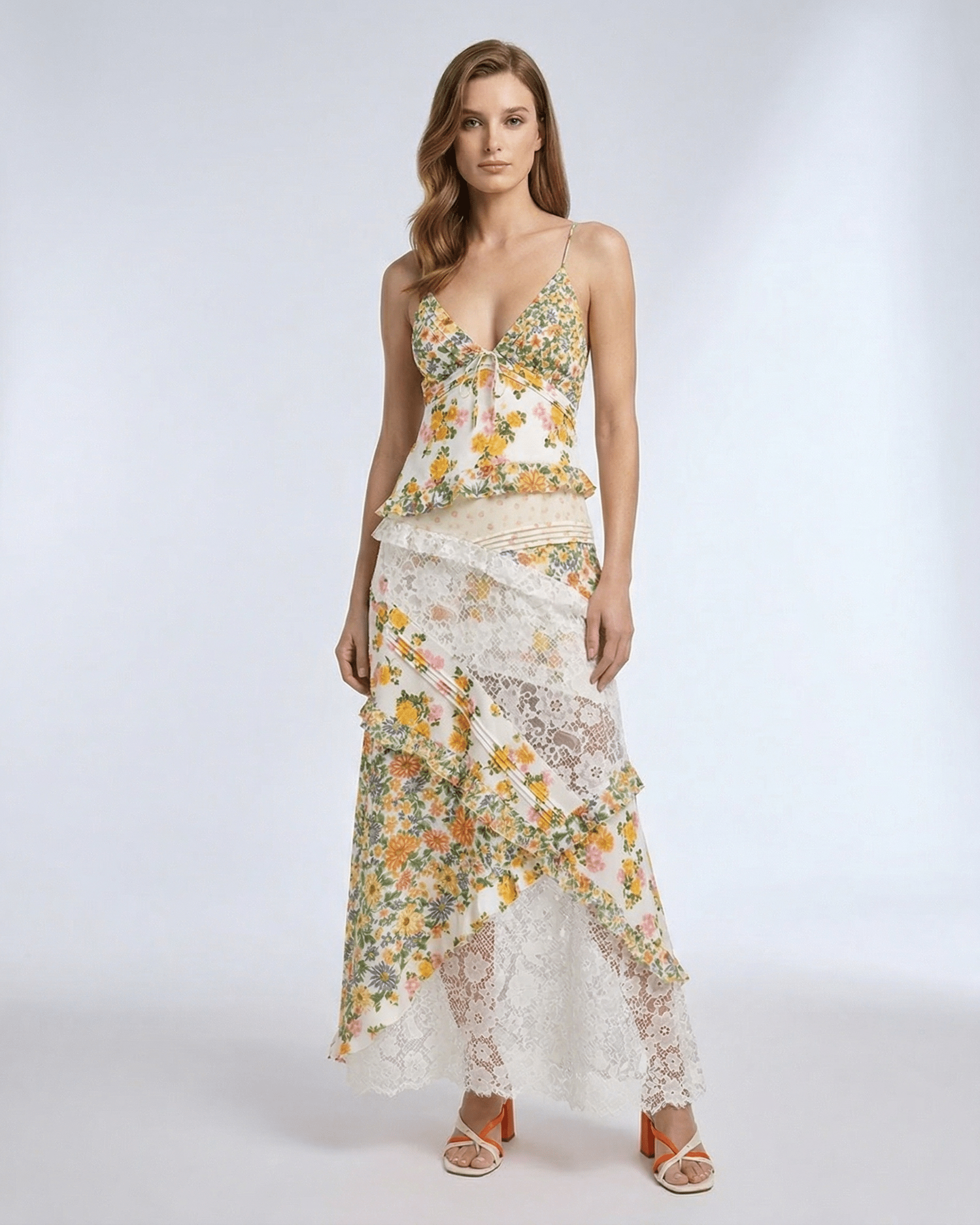 Elara Maxi Dress featuring floral lace ruffle V-neck, soft ivory base with yellow and green patterns by Lauven.