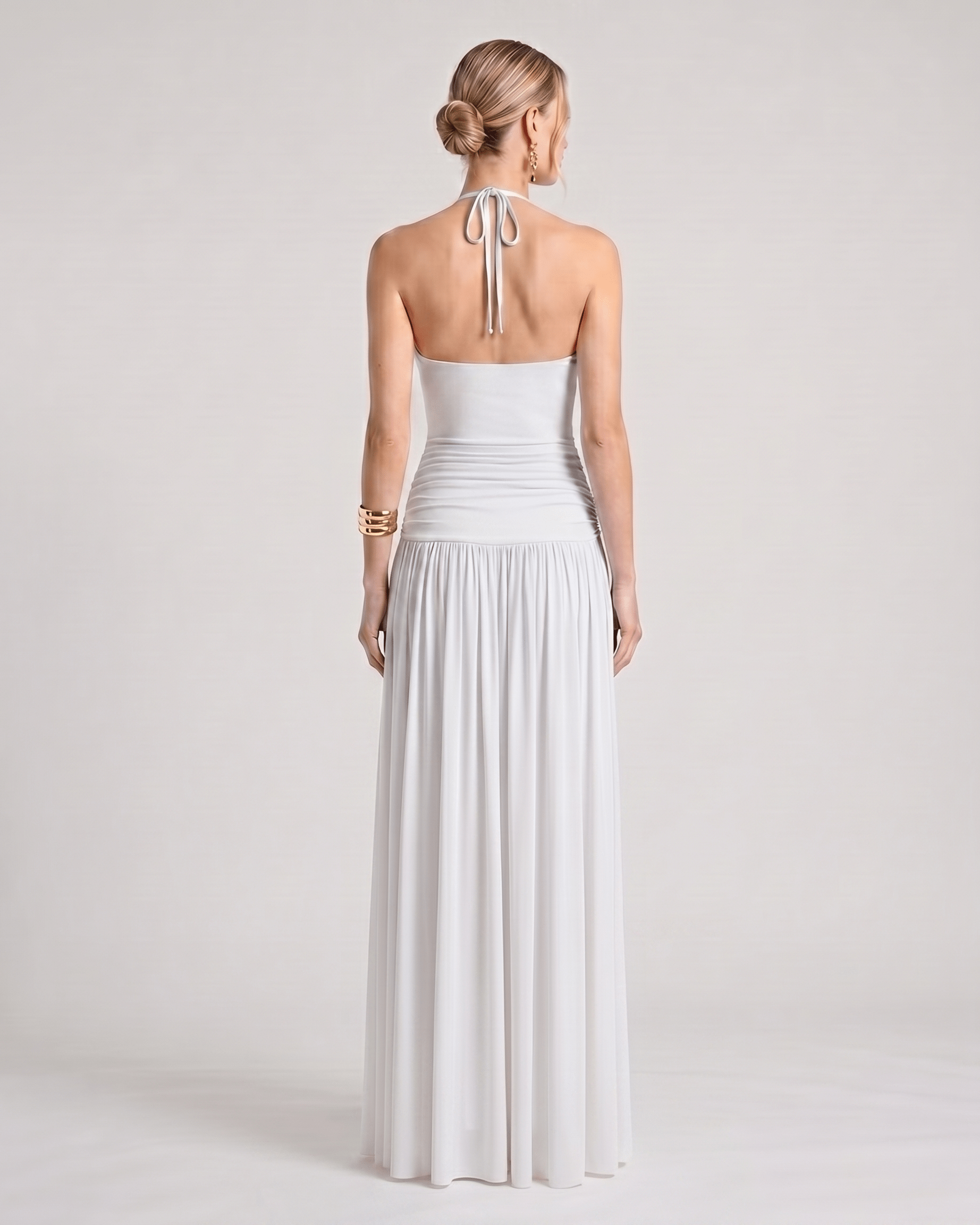 Elara Maxi Dress back view showcasing halter neck, smooth stretch jersey, and flowing silhouette by Lauven.