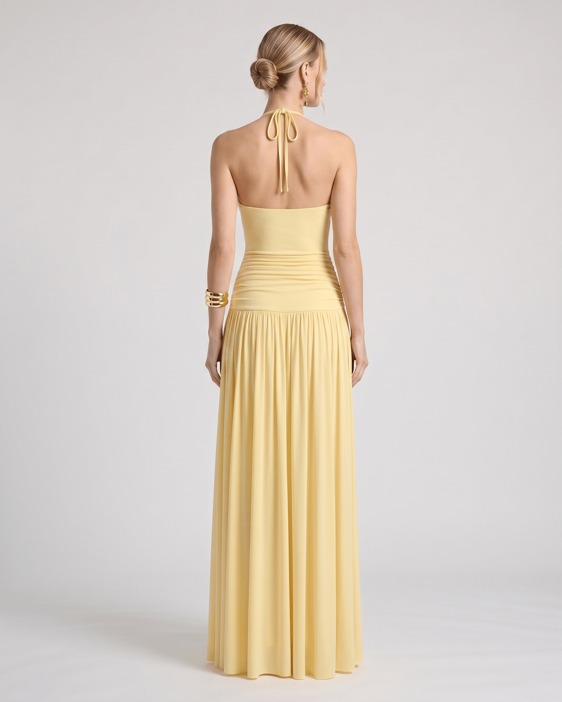 Elara Maxi Dress back view featuring a halter neck, gently ruched waist, and flowing skirt by Lauven.