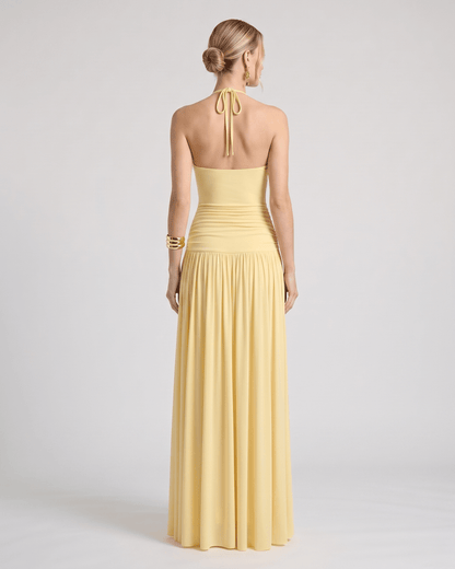 Elara Maxi Dress back view featuring a halter neck, gently ruched waist, and flowing skirt by Lauven.