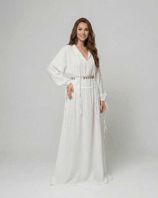 Elara Maxi Dress by Lauven, a white cotton A-Line maxi dress with adjustable waist and long sleeves.