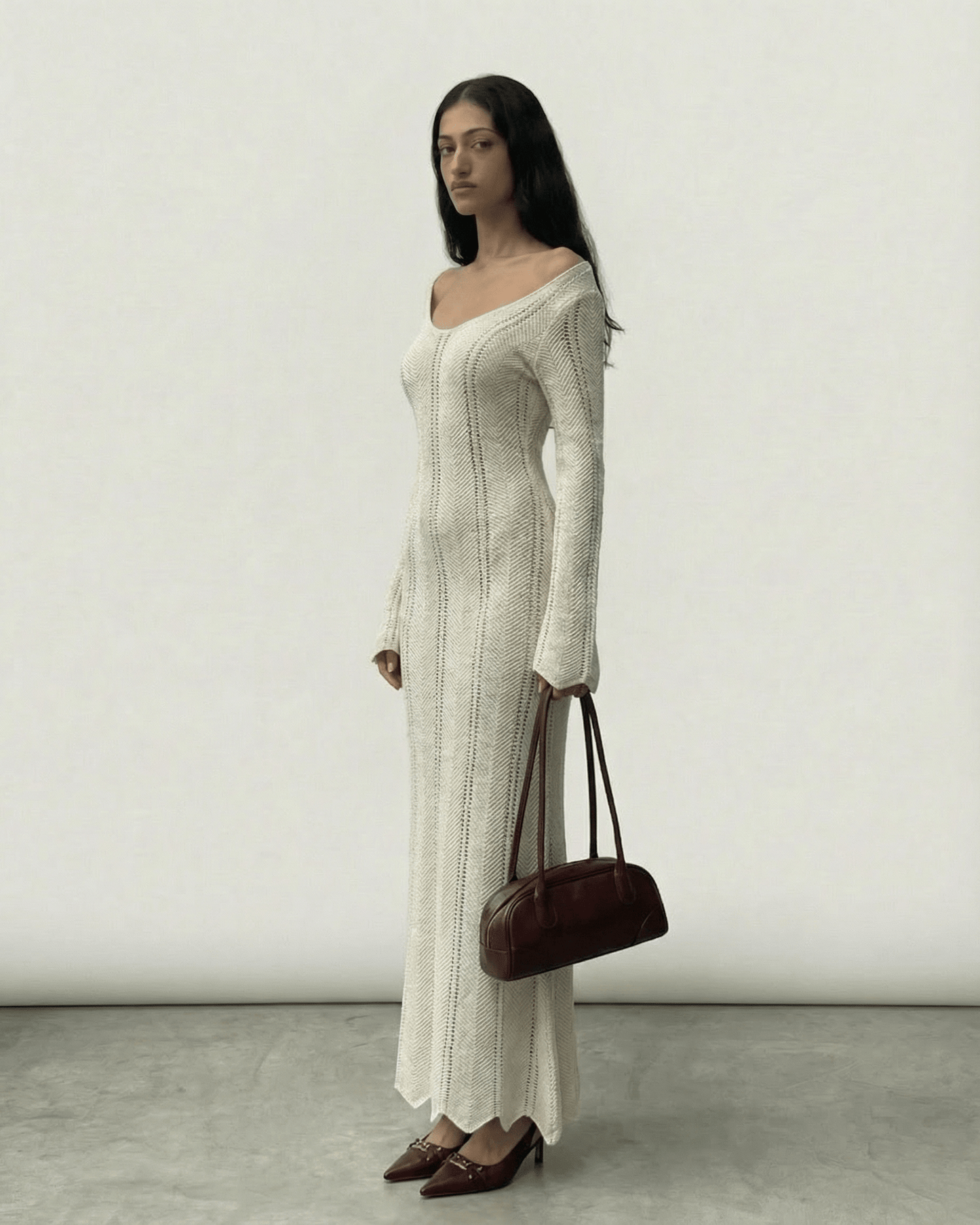 Elara Maxi Dress by Lauven featuring ribbed V-neck bodycon silhouette and long flare sleeves.
