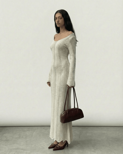 Elara Maxi Dress by Lauven featuring ribbed V-neck bodycon silhouette and long flare sleeves.