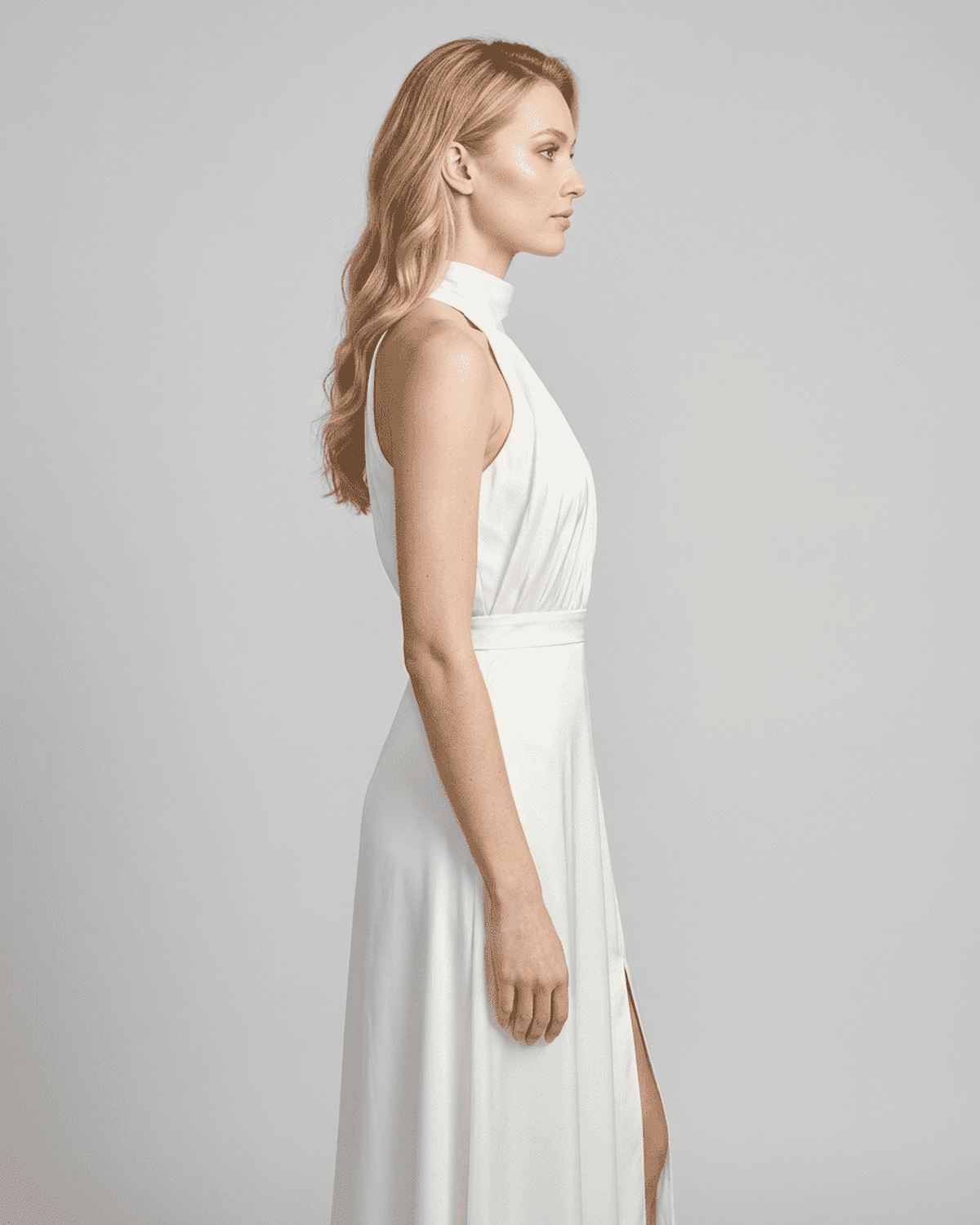 Elara Maxi Dress by Lauven in white, showcasing a sleeveless turtleneck design and elegant high waist.
