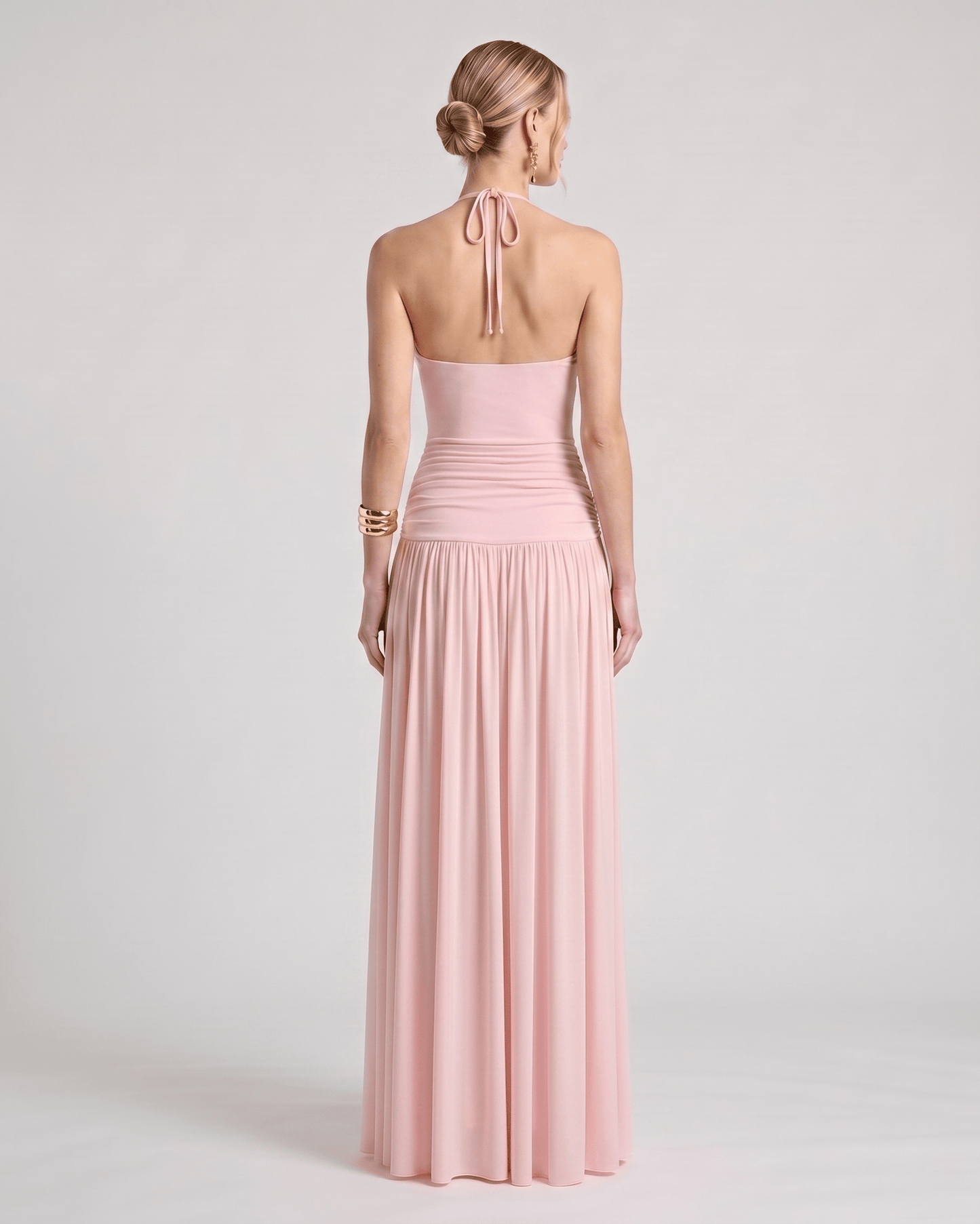Elara Maxi Dress featuring a halter neck, ruched waist, flowing skirt, made of soft stretch jersey by Lauven.