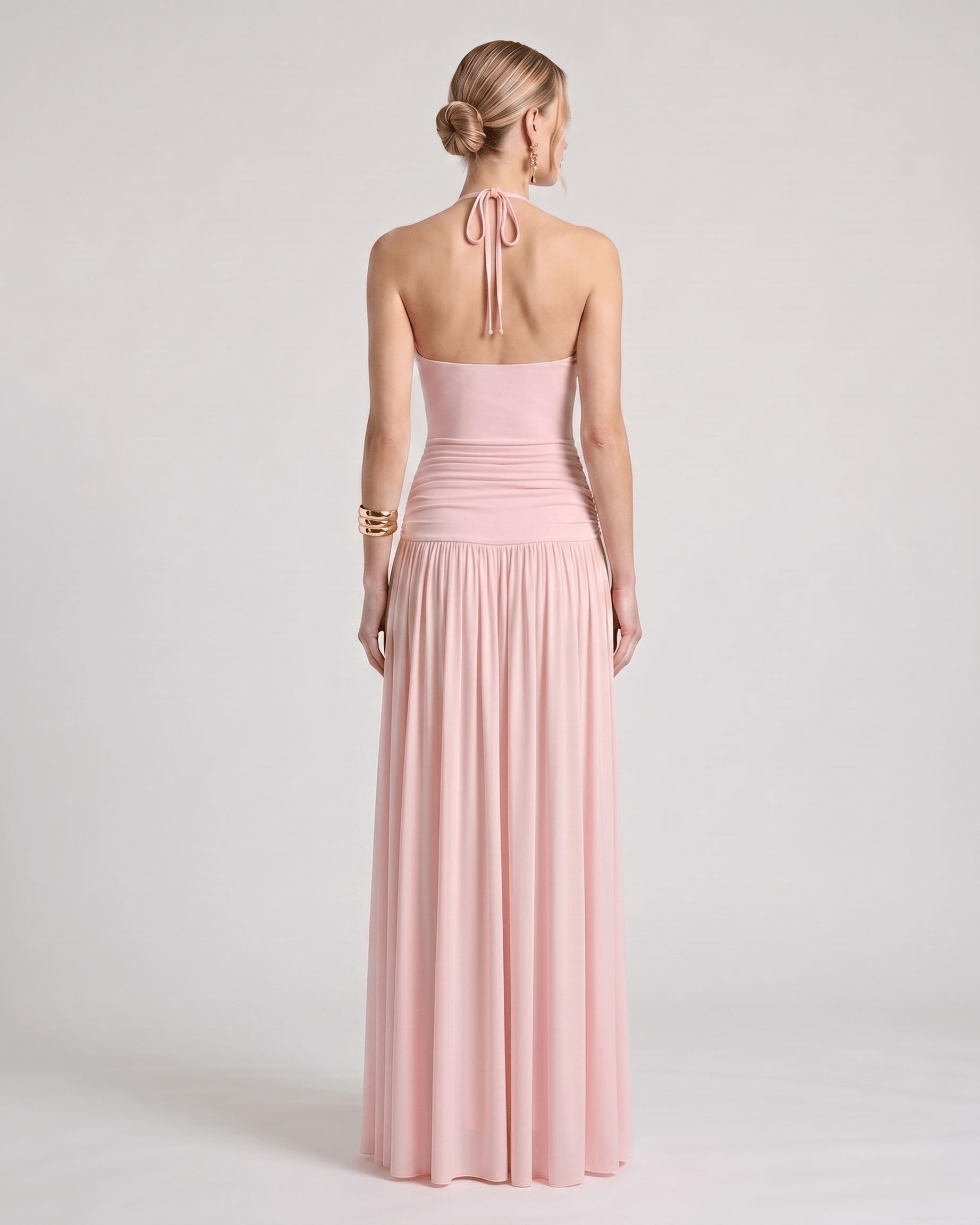 Elara Maxi Dress featuring a halter neck, ruched waist, flowing skirt, made of soft stretch jersey by Lauven.