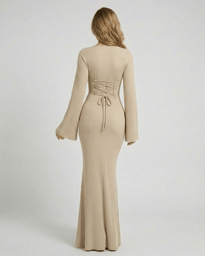 Back view of Elara Maxi Dress in beige, showcasing ribbed knit fabric and elegant long sleeves by Lauven.